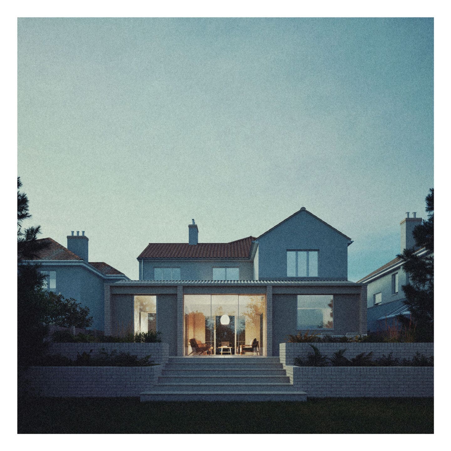 A modern two-storey house designed by a skilled residential architect, featuring large glass windows and a patio, viewed from the back garden at dusk.