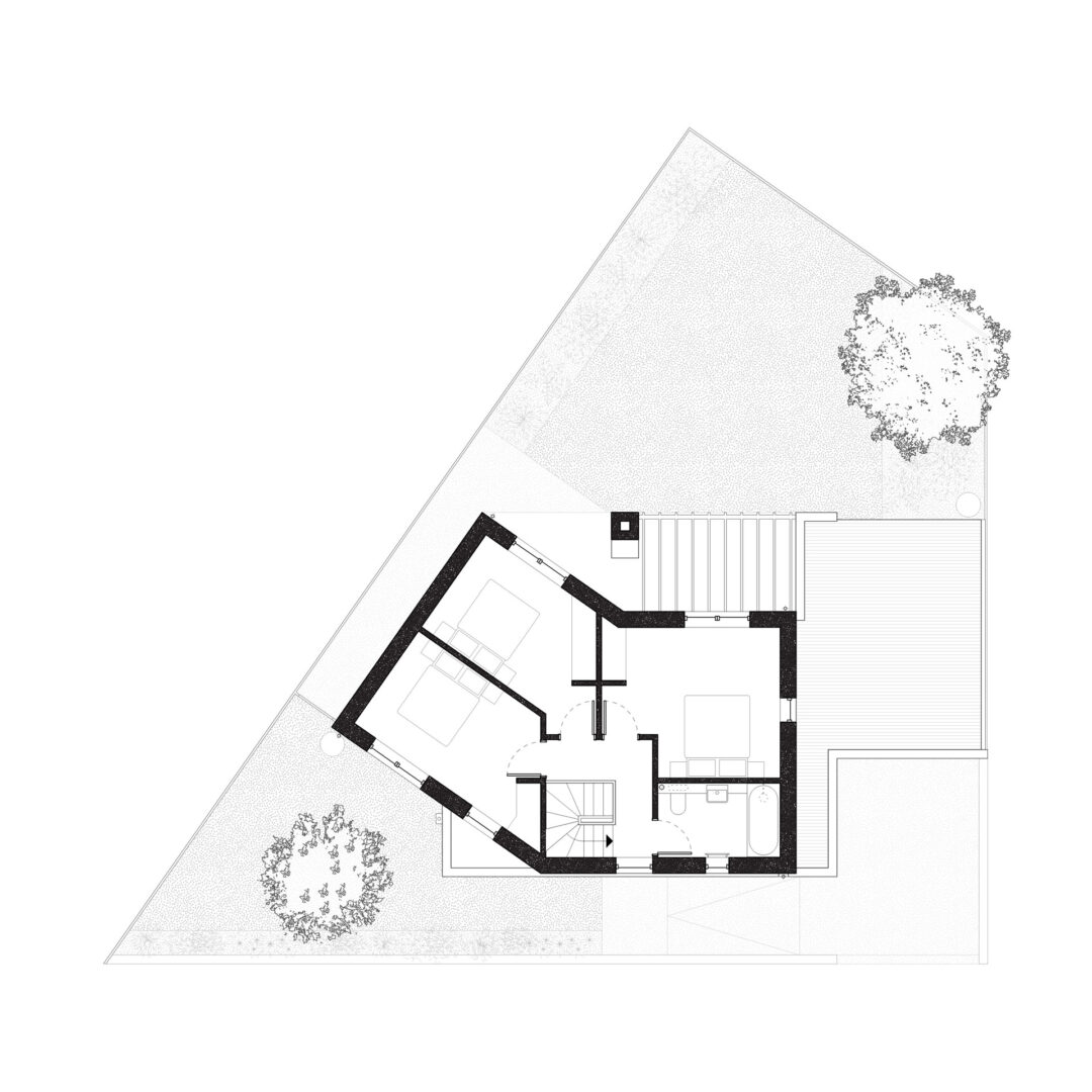 Black and white floor plan by a residential architect shows three rooms, a central staircase, and doorways. Set within a triangular plot, the design features two trees at opposite corners outside.